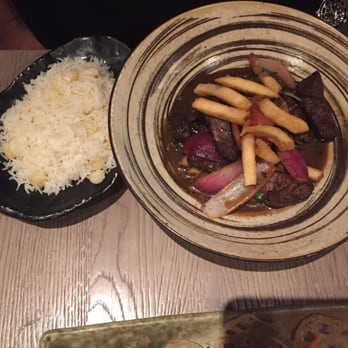 Pisco Y Nazca - Lomo salteado with chocolo rice - Gastropubs Near Me - Kendall, Florida Pisco Y Nazca - Lomo salteado with chocolo rice - Gastropubs Near Me - Kendall, Florida
