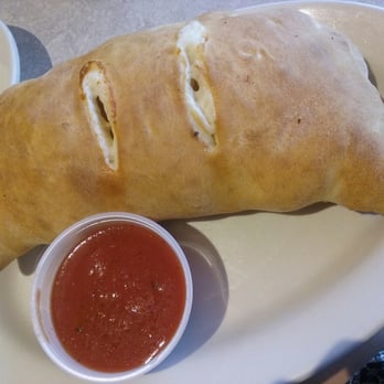 Italian Express - Cheesy calzone with pepperoni - Italian Near Me - Tustin, California Italian Express - Cheesy calzone with pepperoni - Italian Near Me - Tustin, California