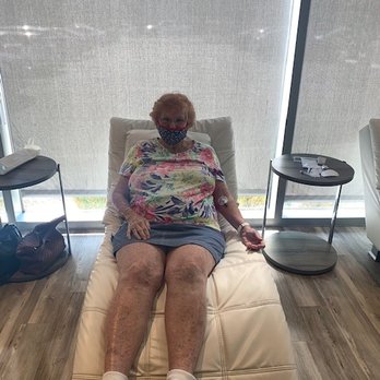 Hydration Room - Mom getting IV treatment helping her pain! - IV Hydration Near Me - Newport Beach, California Hydration Room - Mom getting IV treatment helping her pain! - IV Hydration Near Me - Newport Beach, California