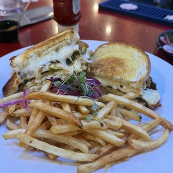 Palapas Brunch & Lounge - Chile Relleno Grilled Cheese 9/10  Poblano pepper cheese stuffed in a sourdough Bread with side of fries, red pickled onion - Mexican Near Me - Corona, California
