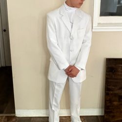 Yaran's Custom Tailoring & Drycleaning - Prom 2022 all white tux rental.
