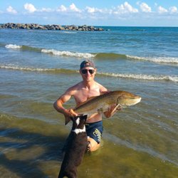 Island House Rv Park - This beach is a 5 min walk from Island House. The jetties are loaded with fish. Reds this size are par for the course on Grand Isle