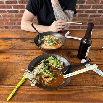 Miso Ramen Bar - (Top) spicy tan tan level 1 (Bottom) spicy miso level 2 also missing a bite - Ramen Near Me - Cary, North Carolina