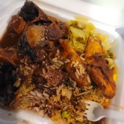 Bamboo Caribbean restaurant - OXTAILS Plate w/ peas & rice, cabbage , & plantains. Chef Kiss $25