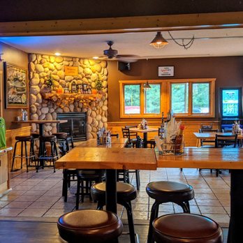 McKenzie Landing - High tables inside the bar area - Pizza Near Me - Spooner, Wisconsin