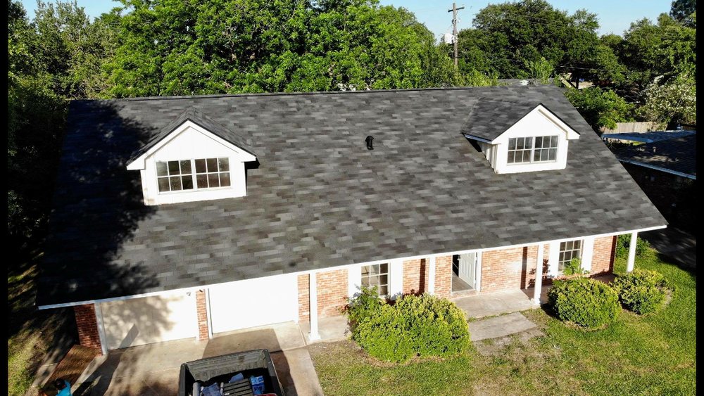 Slide of Legacy Roofing Company