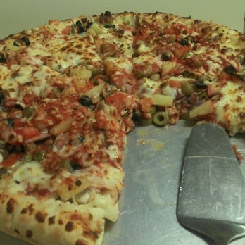 Socios Pizza-Pasta - The Pig Out with garlic instead of ground beef and stuffed crust. - Pizza Near Me - Pace, Florida Socios Pizza-Pasta - The Pig Out with garlic instead of ground beef and stuffed crust. - Pizza Near Me - Pace, Florida