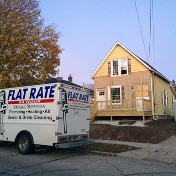 Flat Rate Fox Cities - a flat rate truck parked in front of a house - Plumbing Near Me - Appleton, Wisconsin Flat Rate Fox Cities - a flat rate truck parked in front of a house - Plumbing Near Me - Appleton, Wisconsin