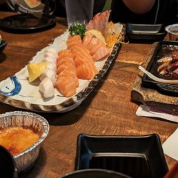 Salmon and various other sashimi, creme brulee