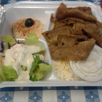 Leo's Taverna - Gyros plate. Hummus in the corner. pita not shown. - Greek Near Me - Honolulu, Hawaii