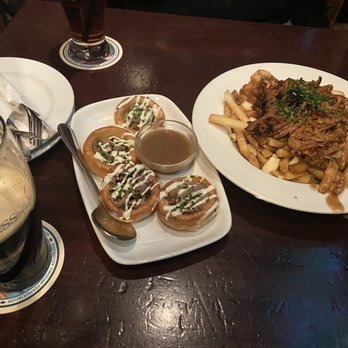 St James's Well Pub - Yorkshire pudding and pulled pork poutine, with my half empty glass of Guinness - Pubs Near Me - Port Moody, British Columbia