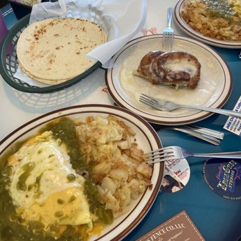 Loyola's Family Restaurant - Cheese omelette, cinnamon roll and eggs smothered in green chili. - Mexican Near Me - Albuquerque, New Mexico Loyola's Family Restaurant - Cheese omelette, cinnamon roll and eggs smothered in green chili. - Mexican Near Me - Albuquerque, New Mexico