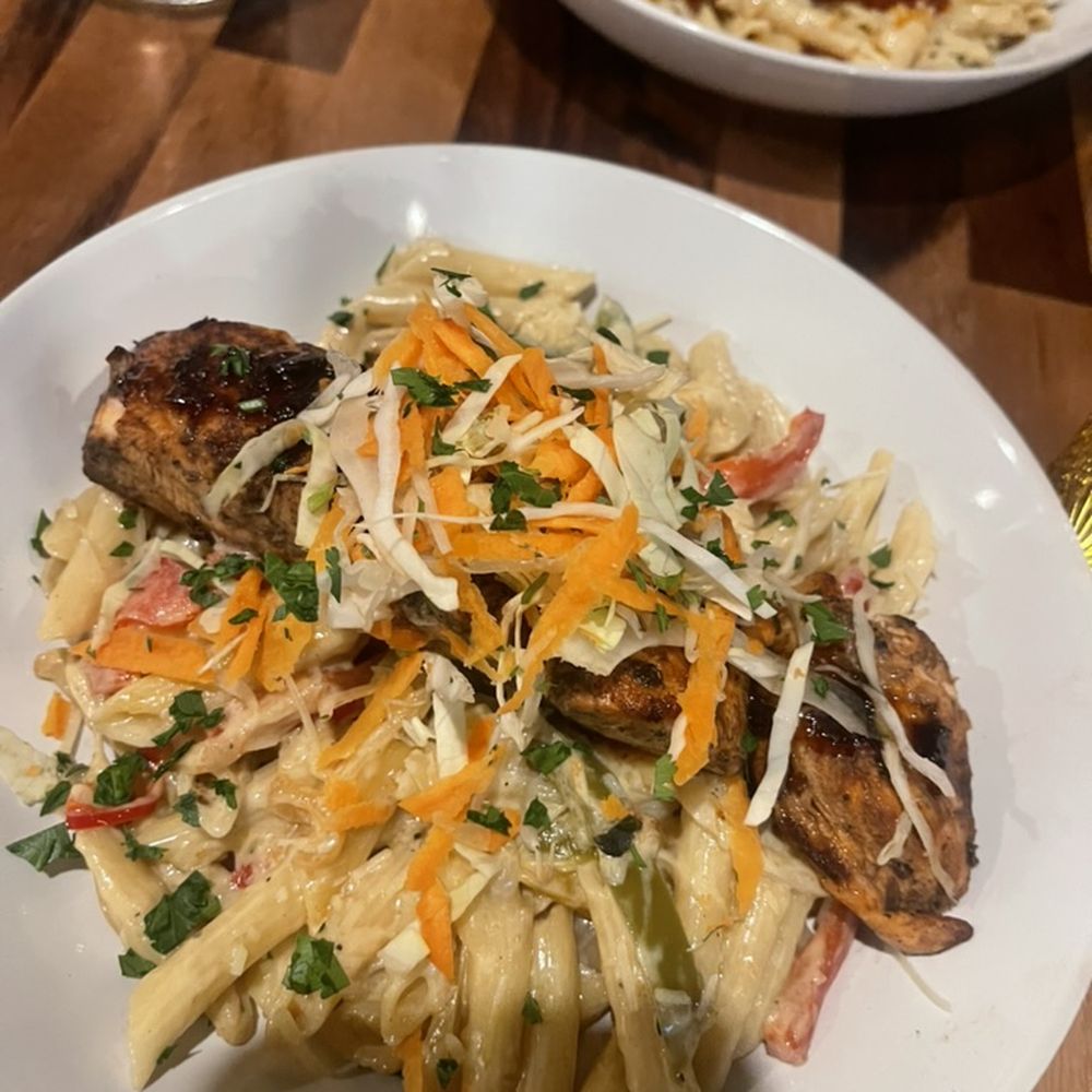 Bacchanal Junction - Rasta Pasta with Jerk Salmon - Bars Near Me - Bloomfield, New Jersey Bacchanal Junction - Rasta Pasta with Jerk Salmon - Bars Near Me - Bloomfield, New Jersey