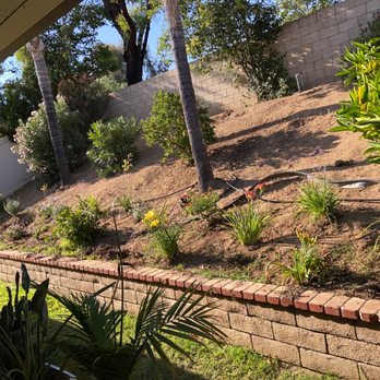 Elite Sod - New flower bed with drip system - Lawn Services Near Me