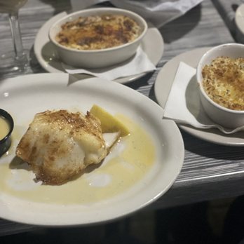 Mr Big Fish - Broiled sea bass, mashed cauliflower and potatoes au gratin potatoes - Seafood Near Me - Naples, Florida Mr Big Fish - Broiled sea bass, mashed cauliflower and potatoes au gratin potatoes - Seafood Near Me - Naples, Florida