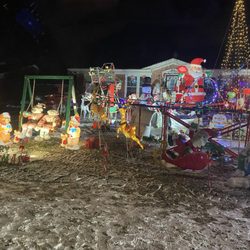 The Awesome Christmas Roller Coaster - December 2025 -- Roller Coaster house has a ton of animated figurines.