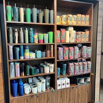 Starbucks - a shelf full of coffee cups and mugs - Coffee & Tea Near Me - Oak Ridge, Tennessee Starbucks - a shelf full of coffee cups and mugs - Coffee & Tea Near Me - Oak Ridge, Tennessee