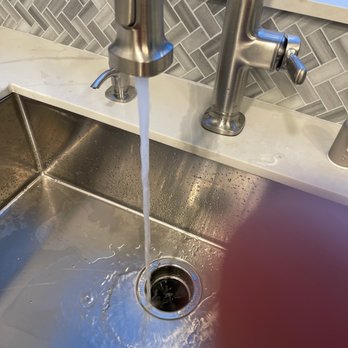 24/7 Plumbing & Rooter - a sink with water running from the faucet - Plumbing Near Me 24/7 Plumbing & Rooter - a sink with water running from the faucet - Plumbing Near Me