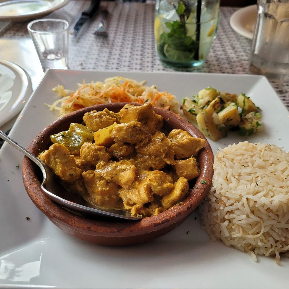 Ali Baba - Chicken curry with mojito in the back. - Turkish Near Me - San Juan, Puerto Rico Ali Baba - Chicken curry with mojito in the back. - Turkish Near Me - San Juan, Puerto Rico