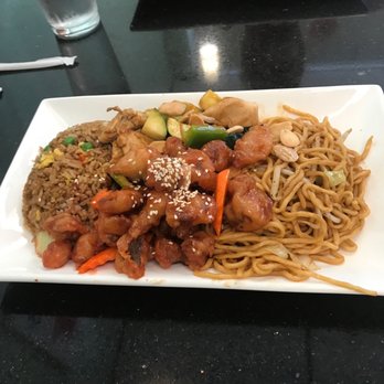 Kitty's Kitchen - Combination with almond chicken and sweet and sour chicken includes chow main and fried rice  Yummy - Chinese Near Me - Manteca, California