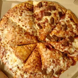 Pizza Hut - Hardly any cheese and suppose to be half cheese and half with meat.