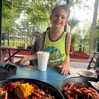 Super 8 by Wyndham Covington - Jett having crawfish in old Mandeville ten min from hotel. Yummy We can boil some Seafood here!! - Hotels Near Me - Covington, Louisiana Super 8 by Wyndham Covington - Jett having crawfish in old Mandeville ten min from hotel. Yummy We can boil some Seafood here!! - Hotels Near Me - Covington, Louisiana