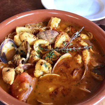 Cha Cha's Latin Kitchen - Seafood Caldo: mahi mahi, shrimp, clams & squid simmered in saffron-tomato broth, herbs & angel hair - Bars Near Me - Brea, California