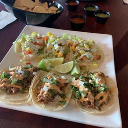 Grilled fish tacos and Carnitas tacos