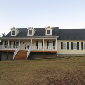 Licking Valley Construction - a house with a deck and stairs - General Contractors Near Me Licking Valley Construction - a house with a deck and stairs - General Contractors Near Me