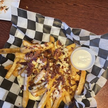 Revolution Golf And Grille - Loaded French fries. - Sports Bars Near Me - Williamsburg, Virginia