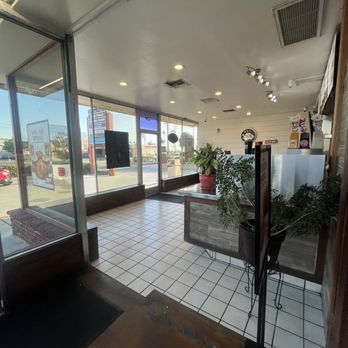 Juan Pollo - Bright and welcoming entrance with clean tile floors, big windows, and a cozy, simple vibe--perfect for a quick, tasty stop. - Mexican Near Me - Covina, California