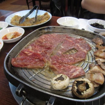 San Soo Gap San - Angus Kalbi (cooking) - Korean Near Me - Flushing, New York San Soo Gap San - Angus Kalbi (cooking) - Korean Near Me - Flushing, New York