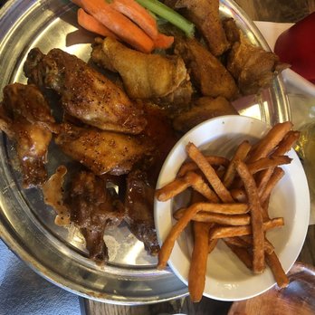 Anchor Bar-Schertz - Single order 1/2 buffalo lemon pepper 1/2 Cajun. Side of sweet potato fries. Very small amount of fries for the order. - Bars Near Me - Schertz, Texas