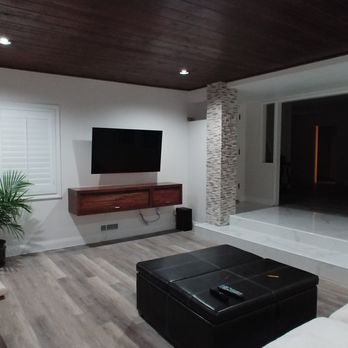 Ores Construction - Finished Living Room, new flooring, stacked stone pilar, stained roof. - General Contractors Near Me - Manhattan Beach, California
