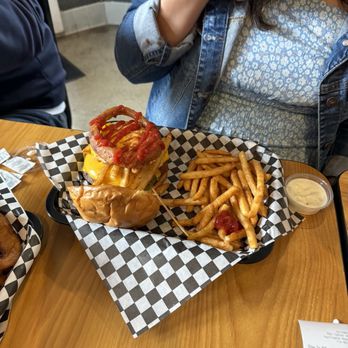 Grinderz - Double Cheese Burger with an over hard egg - Burgers Near Me - Huntington Beach, California Grinderz - Double Cheese Burger with an over hard egg - Burgers Near Me - Huntington Beach, California