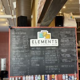 a menu on a chalkboard in a restaurant