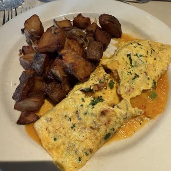 Lucky 32 Southern Kitchen - Crawfish omelette with home fries - New American Near Me - Greensboro, North Carolina