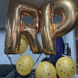 Hawaii Balloon Company - My Bday Balloons this year for a party at Lulu's and now there enjoying my living room