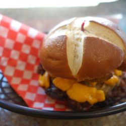 Burger Revolution - Propagnda burger with smoked curds, caramelized onions, and pickels