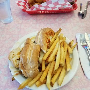 Rosie's Diner - The sausage sandwich which looked appetizing until I opened it and realize there was nothing on the bread except for peppers - American Near Me - Aurora, Colorado Rosie's Diner - The sausage sandwich which looked appetizing until I opened it and realize there was nothing on the bread except for peppers - American Near Me - Aurora, Colorado