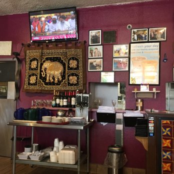 Taaj Palace - Kitchen entrance and TV on mute. - Indian Near Me - Albuquerque, New Mexico
