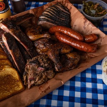 The SALT Smokehouse - a barbecue platter with ribs, briskers, and coleslaw - Barbeque Near Me - Tampa, Florida The SALT Smokehouse - a barbecue platter with ribs, briskers, and coleslaw - Barbeque Near Me - Tampa, Florida