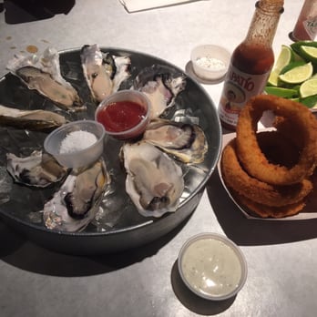 Star Crab - 9.95 fresh oysters and 5.25 onion rings - Seafood Near Me - Riverside, California Star Crab - 9.95 fresh oysters and 5.25 onion rings - Seafood Near Me - Riverside, California