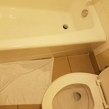 DoubleTree by Hilton - Shower FLOODS the bathroom floor because you can't move the shower head and the curtain is too short - Hotels Near Me - Orlando, Florida DoubleTree by Hilton - Shower FLOODS the bathroom floor because you can't move the shower head and the curtain is too short - Hotels Near Me - Orlando, Florida