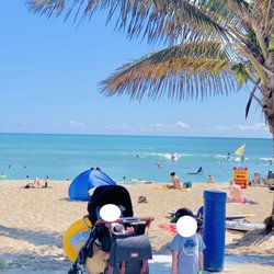 Ewa Beach Park - Getting ready to play in the sand - bring umbrellas to protect the kiddos (not a lot of shade!)