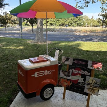 Bliss Pops - Adorable umbrella and cart - Desserts Near Me
