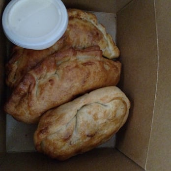 Maria Empanada - Three different empanadas and the green onion sour cream sauce. - Latin American Near Me - Denver, Colorado