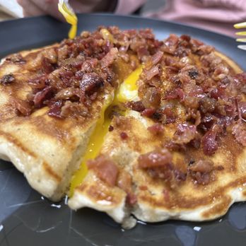 Pappy's - This was some sort of special pancake with a dippy egg inside with crumbled, real bacon all over the place, served with syrup! - Sandwiches Near Me - Uniontown, Pennsylvania
