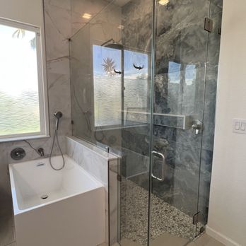 Dimas Calona Glass - After - Seamless glass enclosure that sparkles and makes the same space feel more grand! - Windows Installation Near Me