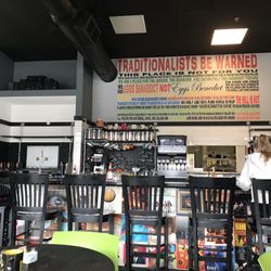 Benaddiction North - Counter seating with kitchen in background